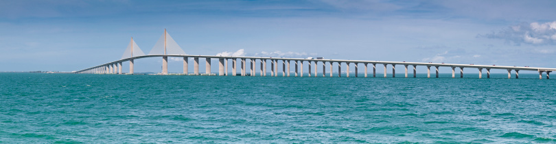 The huge span and high cable stays of the Sunshine Skyway bridge from St. Petersburg to Manatee County across the turquoise waters of Tampa Bay, Florida. ProPhoto RGB profile for maximum color fidelity and gamut.