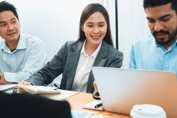 istock Multiracial analyst team use BI dashboard for data analysis with laptop. Concord 1489595158