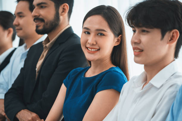 istock Multiracial office worker hold hand in a line promoting synergy. Concord 1489596109