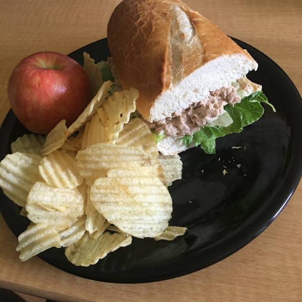 istock Tuna Fish Sub with Potato Chips and Apple 1489600869