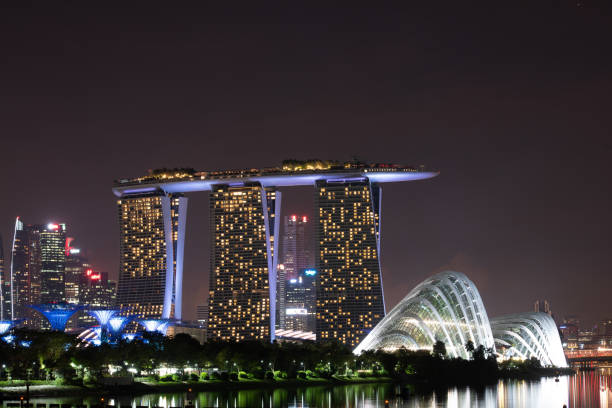 Singapore Marina Bay Sands and Gardens by the Bay by night stock photo