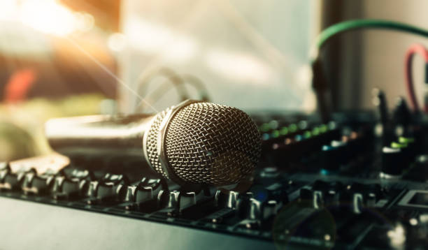 istock Close-up microphone and sound mixer in studio for sound record control system and audio equipment and music instrument. 1489623631