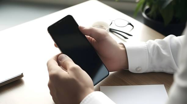 istock Hands of a man who operates a smartphone 1489632600