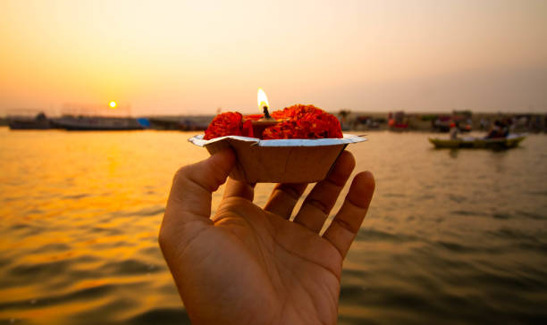 Floating lamp in Ganges river stock photo