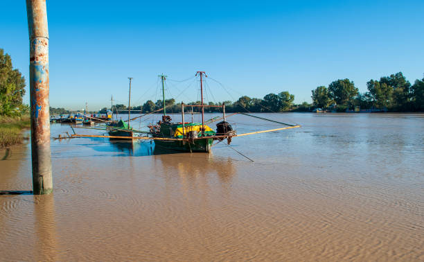 istock the mud surrounds everything even the boats moored 1489642283