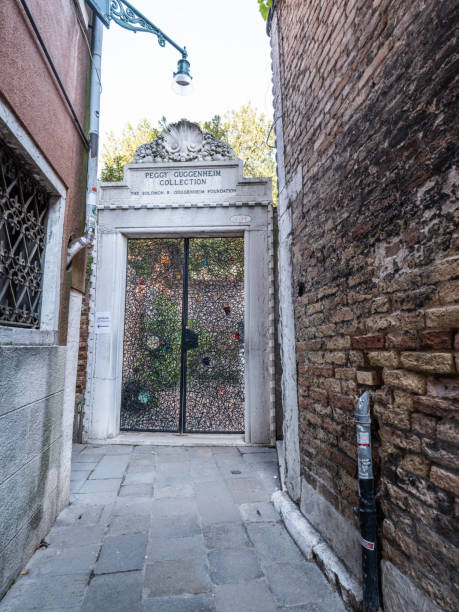 Peggy Guggenheim Collection, Venice, Italy Venice, Italy - April 26, 2023: High resolution. Beautiful garden gate to the Peggy Guggenheim Collection in Venice peggy guggenheim stock pictures, royalty-free photos & images