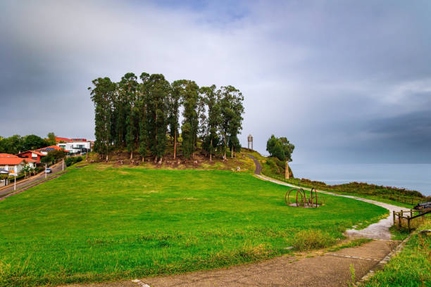 Candas. Atlantic coast, Asturias, Spain. Part of the famous Costa Verde beach. Grove in the city's seaside park on top of a hill