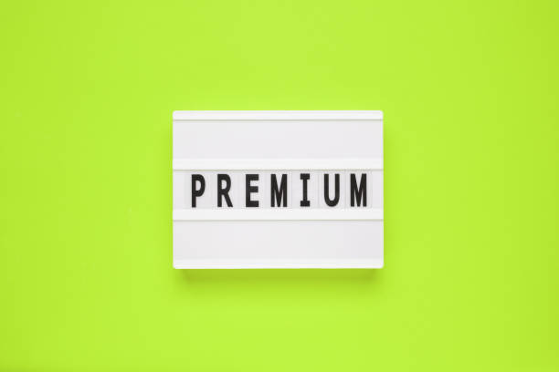 istock The word premium on lightbox isolated green background. Premium Membership Concept. 1489654606