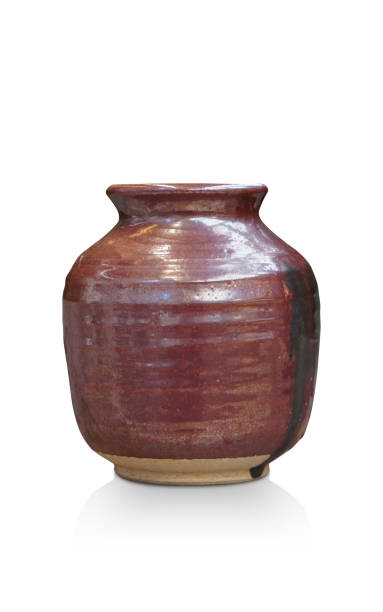 istock old brown and yellow and black pot on white background, object, vintage, retro , nature, copy space 1489655919