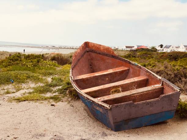 istock Old blue boat Paternoster on beach 1489659815
