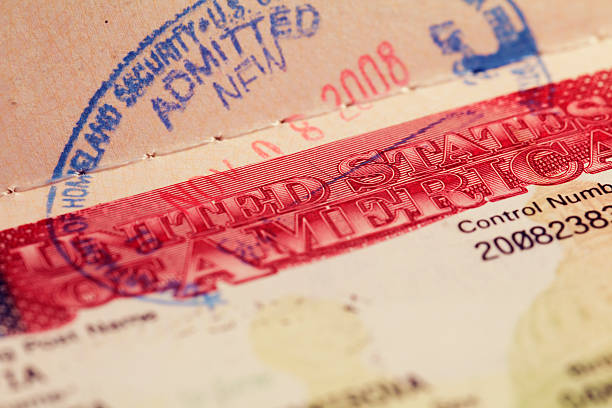 istock US Entry Visa and Immigration Stamp: Close Up 148965988
