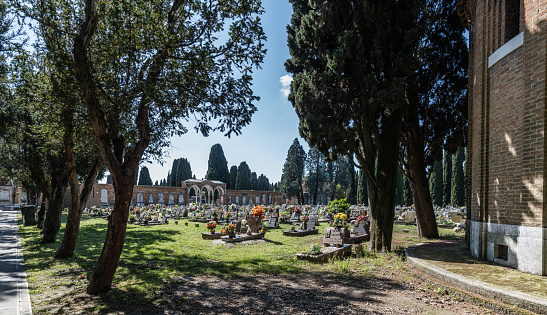 Venice, Italy - April 27, 2023: High resolution. Cimitero di San Michele - San Michele cemetery - on the small island of the same name. The cemetery was established in 1807 during the Napoleonic era.