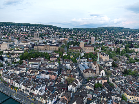 Aerial view over Swiss City of Zürich with the old town and University buildings on a beautiful spring evening with colorful dramatic sky. Photo taken May 6th, 2023, Zurich, Switzerland.