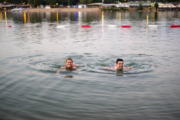 istock A beautiful young couple is relaxing in the water. 1489666743