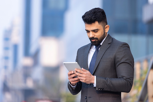 Young businessman with digital tablet