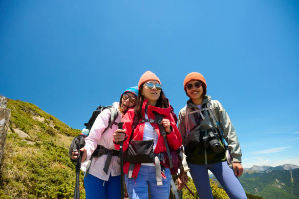 istock Good friends hiking together on the mountain. 1489671421