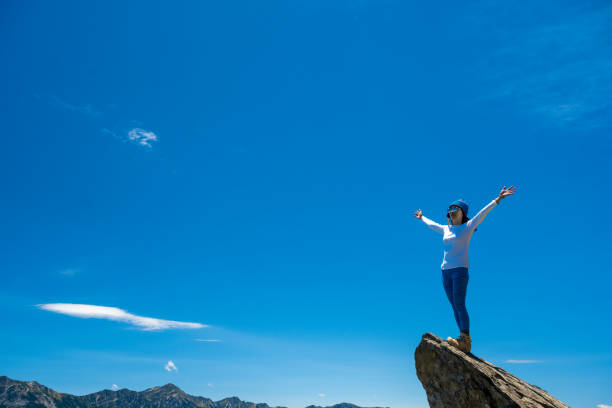 istock Hiker on the top of the mountain peak. 1489685978
