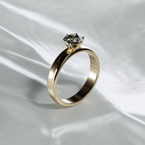 istock 3D rendering of a gold ring with diamonds in studio lighting on white fabric background. 1489697008