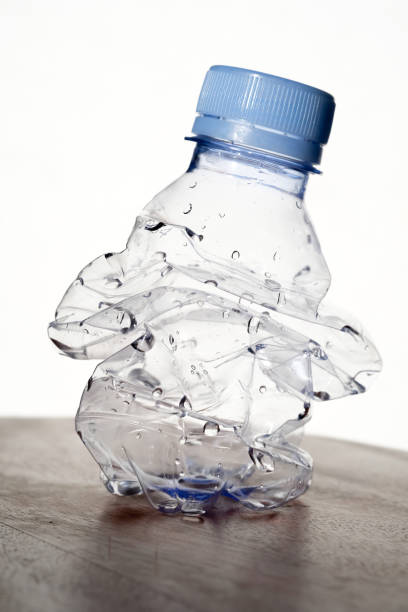 istock Crumpled plastic bottle trash isolated on white background. Environmental pollution 1489700612