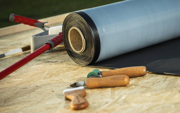 istock Roll of EPDM Roofing Rubber Material and Some Tools 1489712031