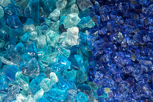 Uncut rough and raw blue and turquoise transparent crystals