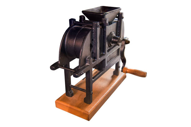 istock Vintage hand cranked coffee grinder isolated on white backgrounds 1489716856
