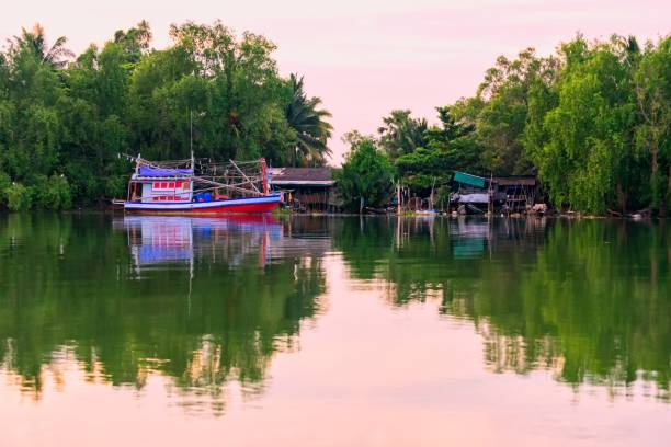 istock House on the Tapi River countryside at Surat Thani, Thailand. 1489720534