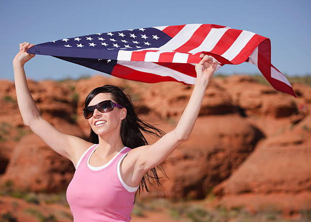 istock Pretty Young Woman with American Flag 148972243