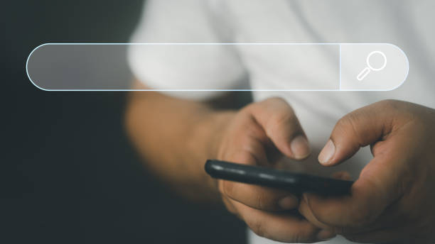 istock Man's hands are using a smartphone to find what they are interested and Searching for information. 1489727334