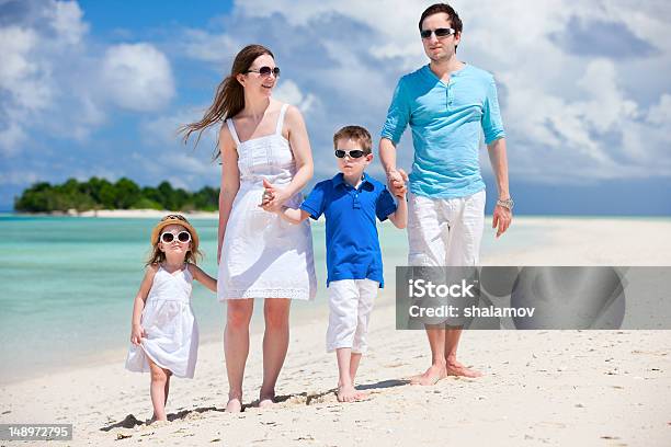 Happy Family On Tropical Vacation Stock Photo - Download Image Now - Adult, Beach, Boys