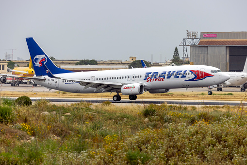 Luqa, Malta - May 8, 2023: Travel Service Boeing 737-9GJ-ER (REG: OK-TSM) operating Air Malta flight KM613 from Rome, Italy.