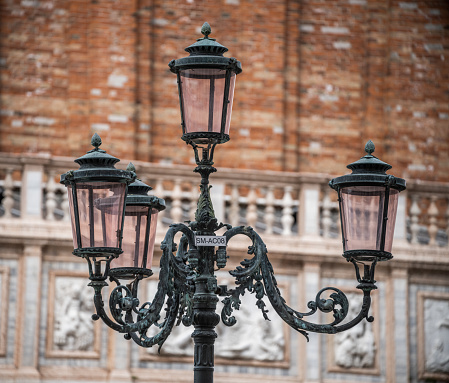 Murano glass street lamp at Venice under fog.