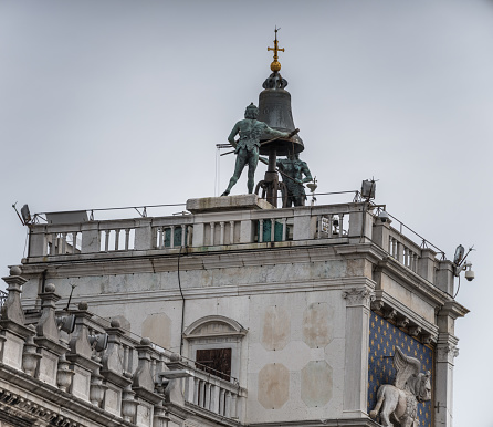 Venice, Italy - April 28, 2023: Bells on top of St. Mark's clock tower