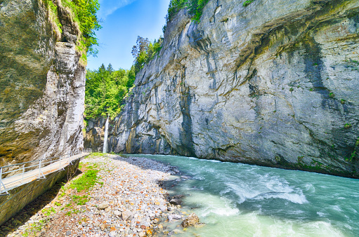 Aare Gorge near Meiringen, Bernese Oberland, Switzerland. The Aare River eroded a path through rock formation resulting in a gorge which is 1400 metres long and up to 200 metres deep