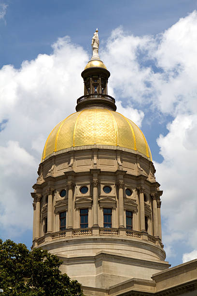 istock Georgia Capitol Dome in front of blue skies 148975009
