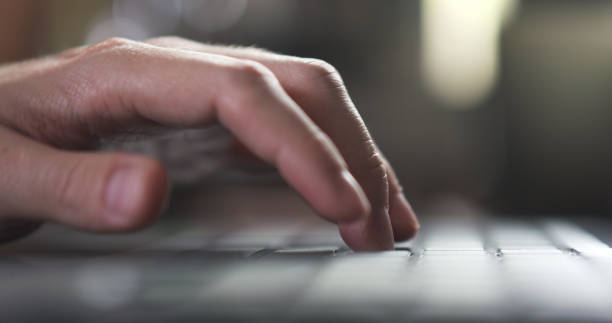 istock young man hand using notebook in cafe or home very shallow focus 1489756884