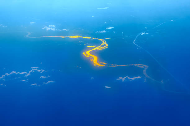 Aerial Blue Earth and River Meander Aerial Blue Earth and River Meander . River Meandering Through A Valley green valley denmark stock pictures, royalty-free photos & images