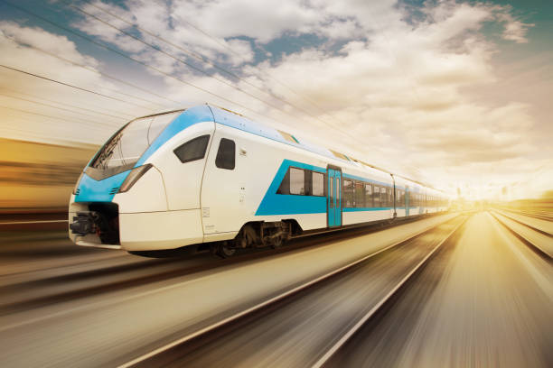 istock High speed passenger train with motion blur from sunset background 1489774563