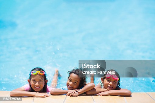 istock Kids in swimming pool. Children swim. Family fun. 1489779766