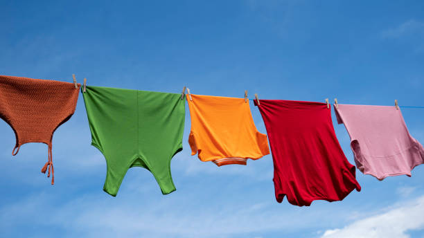 istock Clothes hanging to dry on a laundry line 1489780415