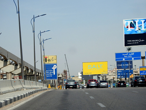 Cairo, Egypt, May 9 2023: Cairo monorail site that is under construction by Orascom company with the columns and the tracks in New Cairo city, rapid transit system, longest driver less monorail, selective focus