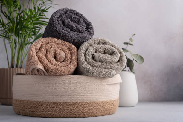 istock Rolled cotton towels in basket 1489785985