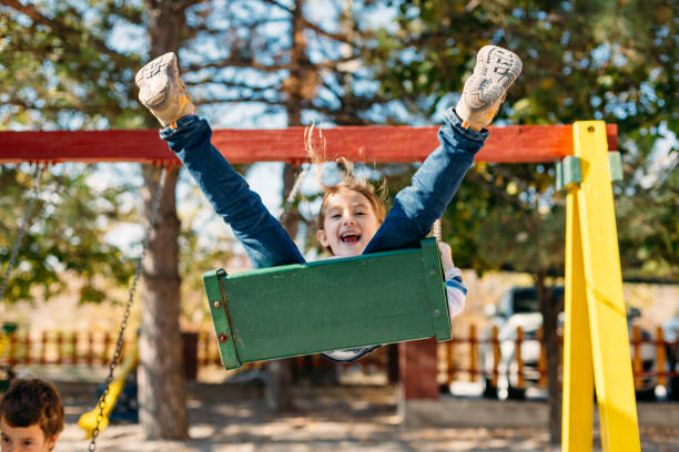 istock Children swinging in the park 1489786454