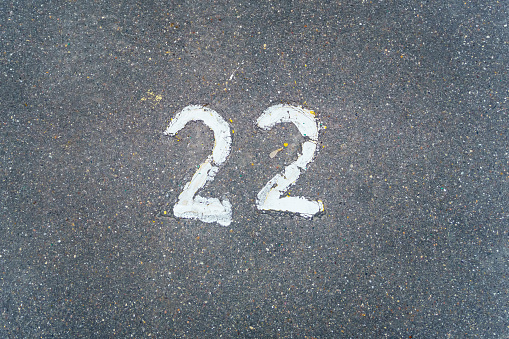 a street on a road with the number two painted on it