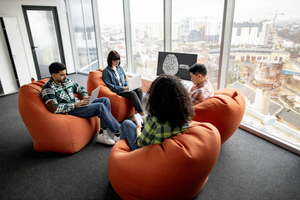 istock Professionals with gadgets working on AI project in office 1489796033