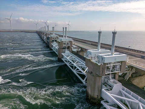 This aerial photo taken with a drone shows the Oosterscheldekering, also known as Eastern Scheldt Storm Surge Barrier.  This bridge over the water in Zeeland also protects the land behind the barricade against high tide and flooding.  It is part of the Delta Works.