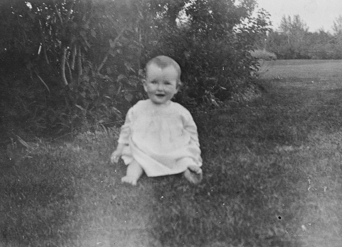1 year old baby girl at the city of Saskatoon in Saskatchewan, Canada. Vintage photograph ca. 1925.