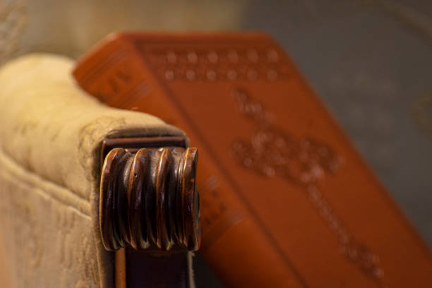 istock Bible resting on arm chair 1489805917