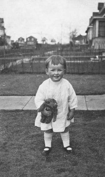 2 Year Old Girl with Teddy Bear in Saskatoon, Saskatchewan, Canada  - 1926