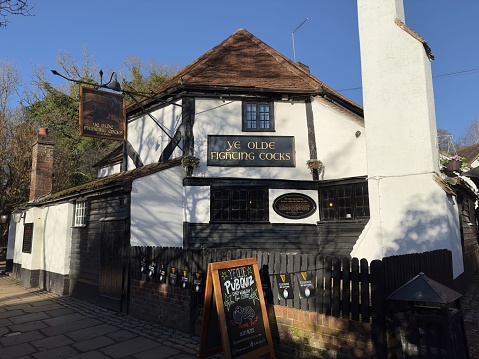 St Albans, United Kingdom – February 06, 2023: A white brick building of Ye Olde Fighting Cocks Pub - St Albans, England, United Kingdom